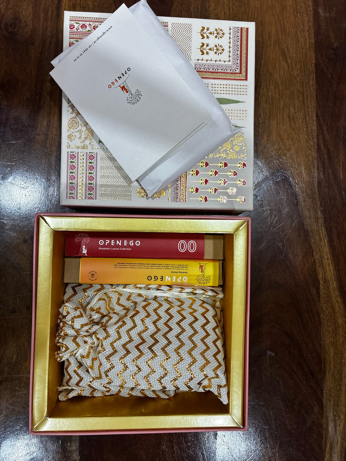 Ganesha The First Offering gift box opened to show its contents